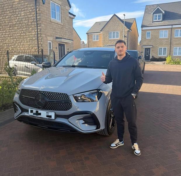 Customer collecting their new car from Players Cars